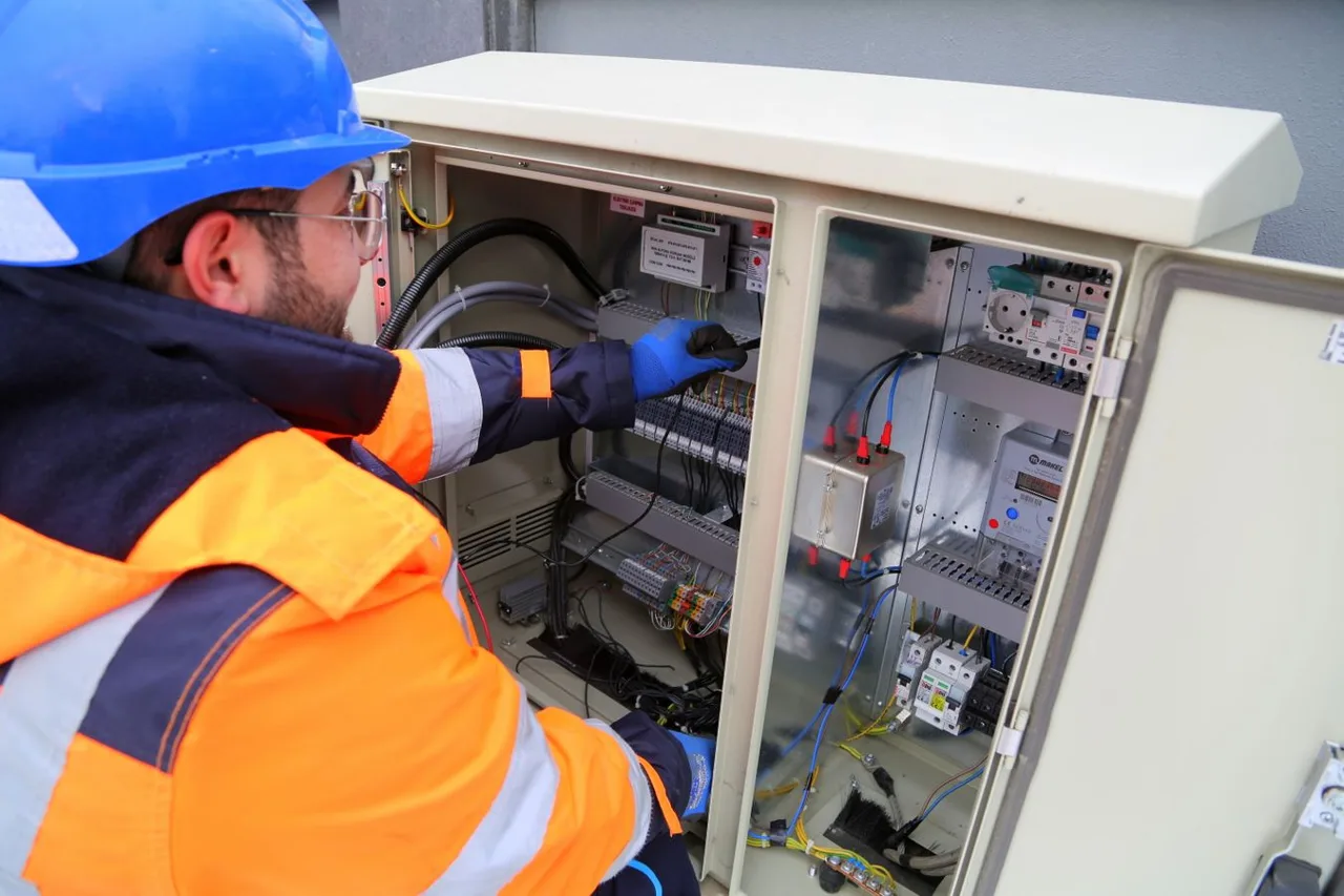 Electrician inspecting commercial electrical equipment